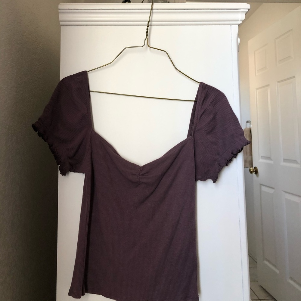 Soprano purple/gray shirt